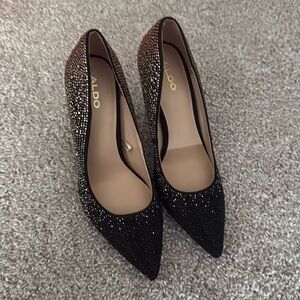Aldo Stessy pumps featuring a black and rose gold ombré rhinestone embellishment